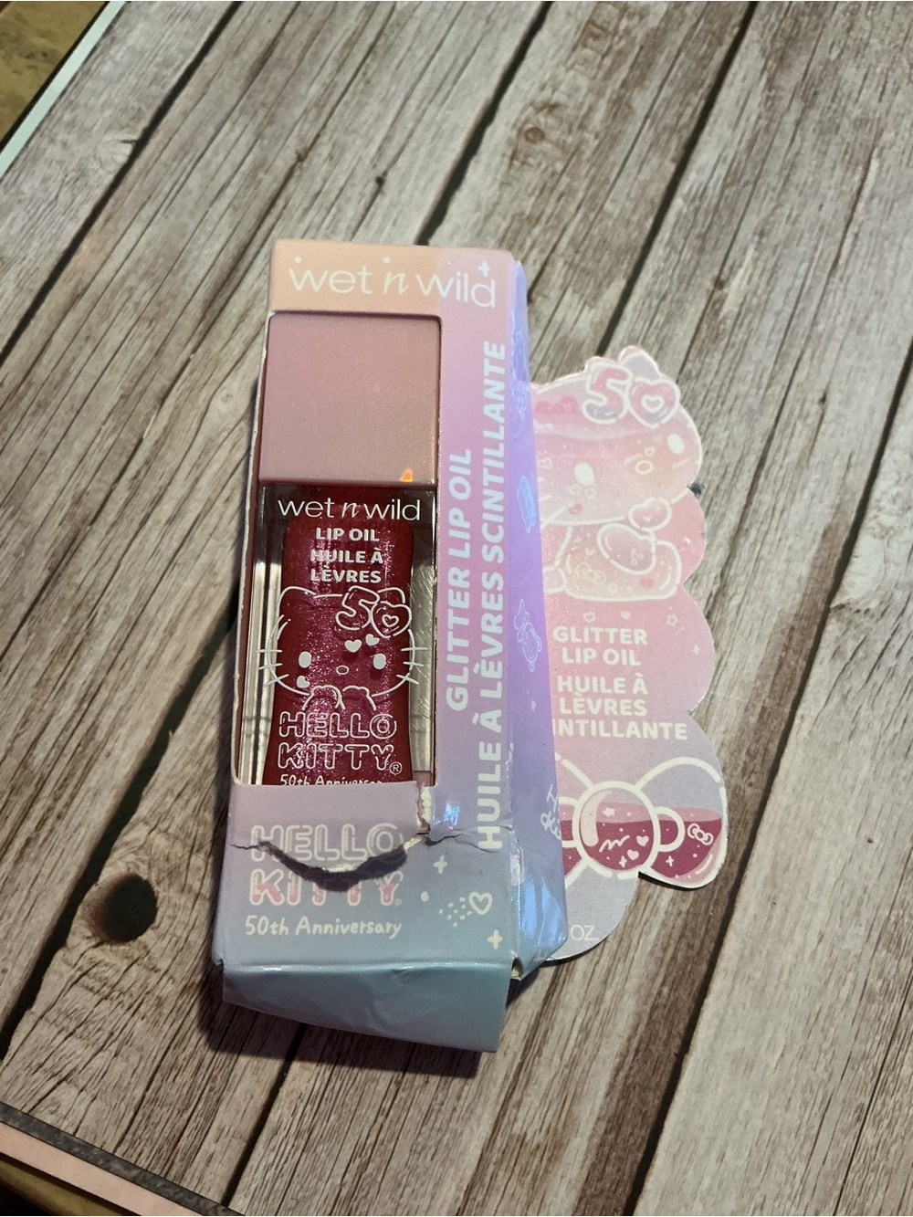Wet N Wild x Hello Kitty Glitter Lip Oil in Purrfect